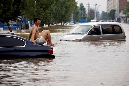 Число погибших в наводнении в Китае выросло до 302