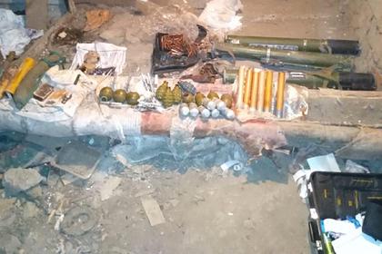В подвале российского дома нашли склад взрывчатки и боеприпасов