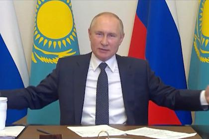 Путин руками показал казахстанскому президенту размер российского тигра