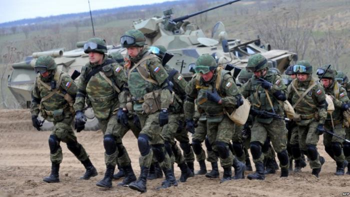 Россия отводит часть военных из Крыма и границы с Украиной
