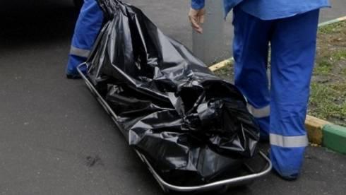 В Караганде на улице Ермекова за огороженной территорией нашли тело погибшей женщины